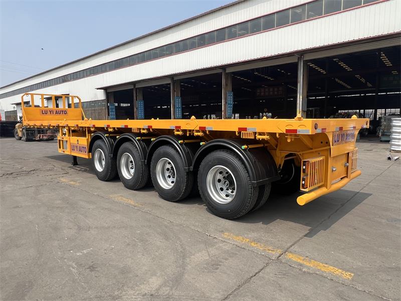 Xe moóc bán tải phẳng 4 trục 80T hạng nặng để vận chuyển container và hàng hóa nặng